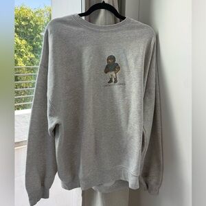 Grey Crewneck Sweatshirt with Football Player Graphic